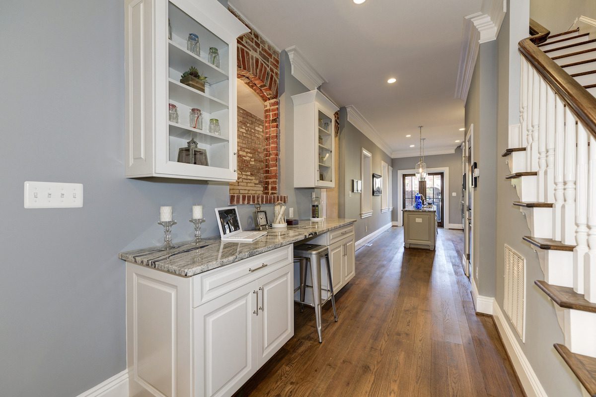 kitchen-desk-stool-seating-exposed-brick-wall