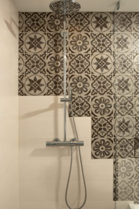 A photo of custom tile work in a European style bathroom